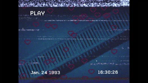 PLAY indicator popping up, timecode updating, noise rising, hearts drifting on Video stock 313328194