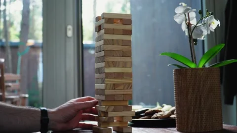 Play jenga game Stock Footage 197375681