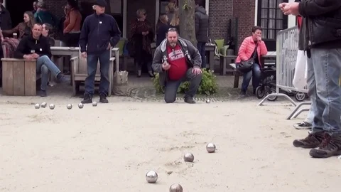 Play Jeu de Boules on your knees. Stock Footage 82258919