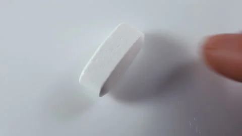 Play with a large long tablet in a shiny shell. On a white background, close-up, Stock Footage 144642053