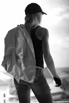 The play of light and shadow 4  (Black and white, face, cap, model, woman, body) Stock Photos