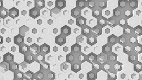 The play of light and shadow on the surface of a moving hexagonal grid. Seamless Stock Footage 125564621