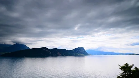 Play of light and shadows after the storm over the Alps Stock Footage 110790654