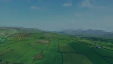 On play, line chart sliding over aerial farmland segments pulsing and rising, Stock Footage 317184307