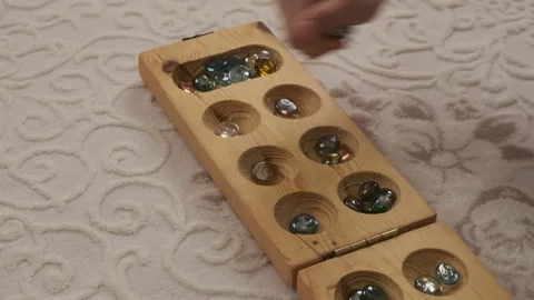 Play mancala, intelligence game mancala, middle east intelligence game mancala, Stock Footage 126407683