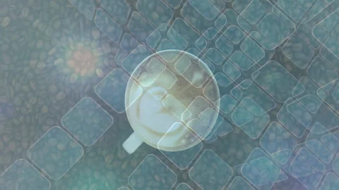 On play, mug rotating gently while grid panels drifting, light streaks Stock Footage 311697658