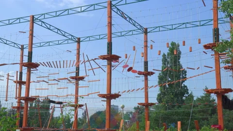 Play obstacle course for climbing ropes and training climbers. Suspended rope Video stock 201340326