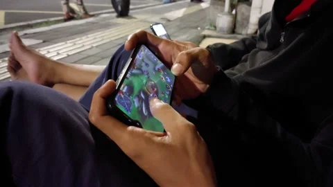 Play online games on mobile Stock Footage 231454904