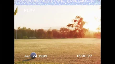 PLAY overlay starting, camera panning left, timestamp counting, golf ball Stock Footage 333059214