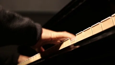 Play the piano Stock Footage 82446858