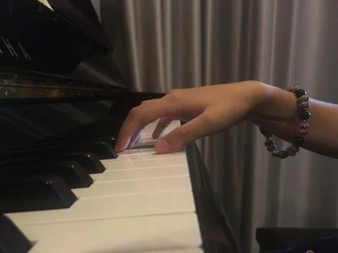 Play the piano Stock Photos