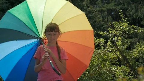 Play with rainbow parasol. Video stock 126986621
