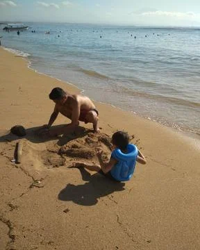 Play sand in beach Stock Photos