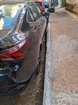 Play of shadows and reflections on the details of a car. Фото