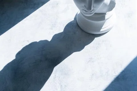 A play of shadows on the concrete surface from the bright sunlight around t.. Stock Photos