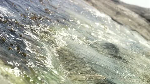 Play of sunlight on the surface of water Stock Footage 11340075