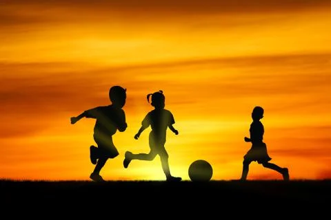 Play at sunset. Stock Photos