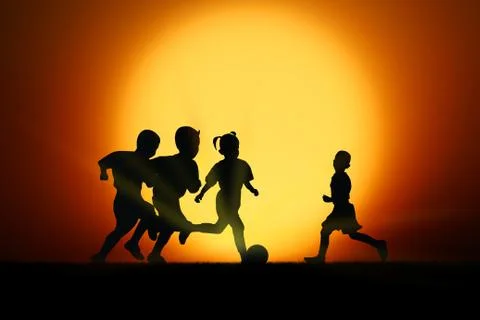 Play at sunset. Stock Photos