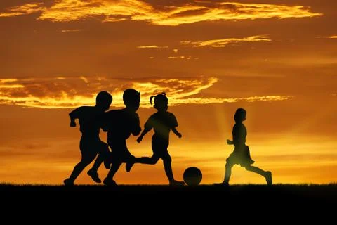 Play at sunset. Stock Photos