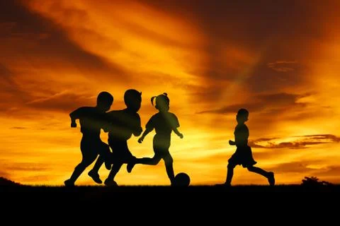 Play at sunset. Stock Photos