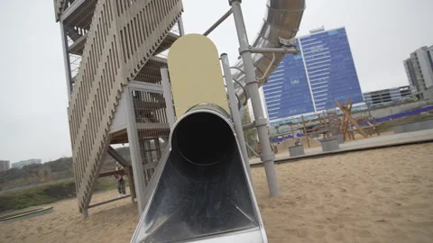Play system for children with twisting tunnel slide Stock Footage 306456638