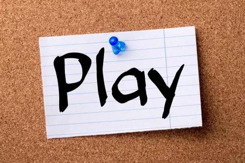 Play - teared note paper pinned on bulletin board Stock Photos