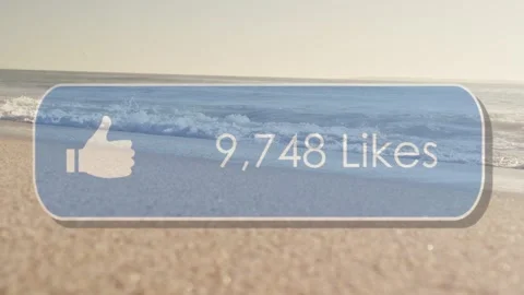 On play translucent likes counter updating over sandy beach, thumbs-up pulsing Stock Footage 333735113