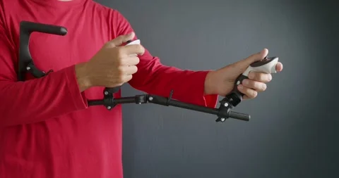 Play Virtual Reality shooters game with gun stock. Rifle simulator. Stock Footage 279488665