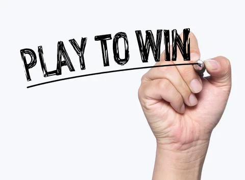 Play to win written by hand Stock Photos