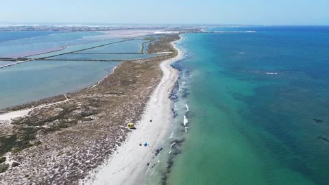 Playa de la Llana Separating Mediterranean Sea and Salt Ponds Stock-Footage 339714814