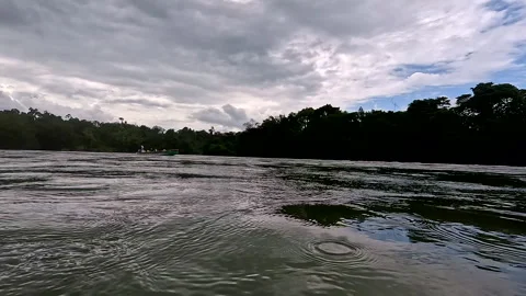 Playa de Oro, Ecuador: 8-11-2022: people of the community are arriving by canoe Видео 336913623