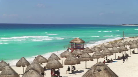 Playa Delfines, a popular sandy beach on Caribbean sea coast in Cancun Stock Footage 157672606