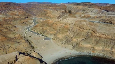 Playa Medio Almud and cliffs in Gran Canaria Stock Footage 138756892