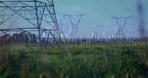 On playback camera panning through grass revealing steel towers with waveform Video stock 329427955