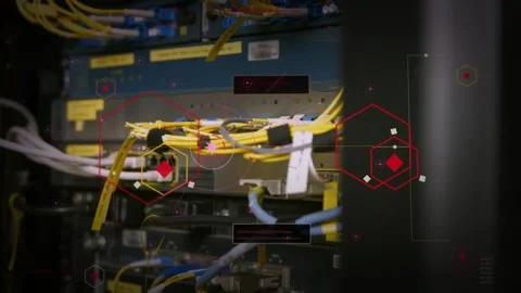 On playback red HUD overlays pulsing over patch panel, highlighting yellow fiber Stock Footage 335404308