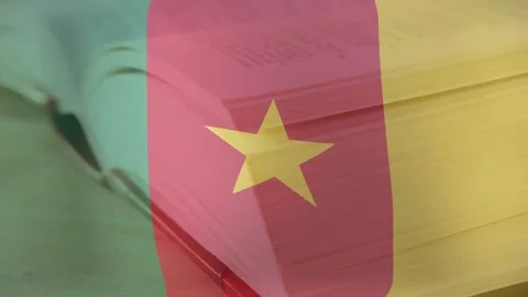On playback start open book flipping pages under static Cameroon flag overlay to Stockbeeldmateriaal 317128263