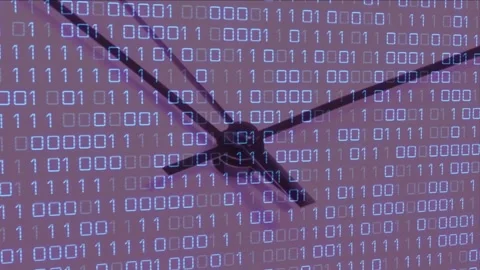 Playback starting, ceiling fan blades rotating across blue binary grid, showing Stock Footage 328584428