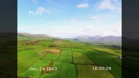 Playback starting with PLAY icon, timecode shifting, farmland drifting over Video stock 329691080