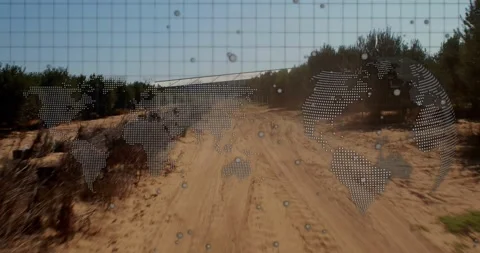 Playback starting, sandy road with dotted world-map overlay moving forward, Stock Footage 333830006