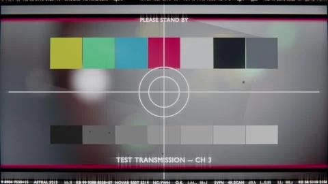 Playback starting, test card displaying on monitor for checks with magenta Stock Footage 340268308