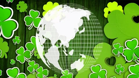 Playback starting, wireframe globe rotating east, lands turning, shamrocks Stock Footage 328229327