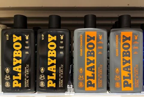 Playboy VIP and Game Changer Shower Gel Bottles on Shelf Stock Photos