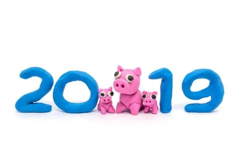 Playdoh figure: Family pig. Symbol 2019 New year's Stock Photos