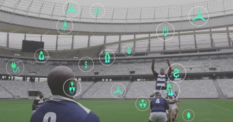 Player 2 watching thrower launching rugby pass lifting jumper securing control Video stock 330563926