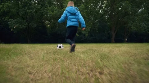 Player is developing soccer dribbling skills. Ball control. Training, football Stock-Footage 165741015