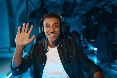 The player is greeted on the web camera before the start of the tournament. Stock Photos