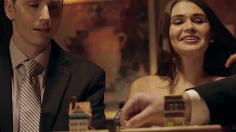 Player helps another move his game piece Stock Footage 42893830
