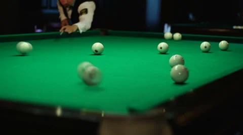 The player hits the ball in billiards Stock Footage 54579152