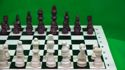 The player performs the first move with a white pawn for three squares ahead Stock Footage 95762373