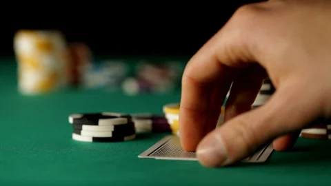 Player see a good poker hand Stock Footage